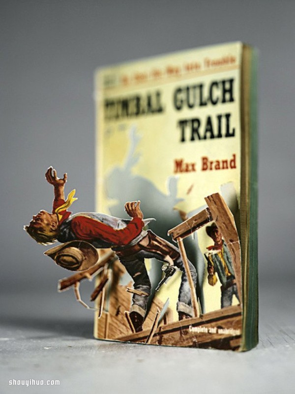 My book...comes to life! Interesting 3D paper-cut book art