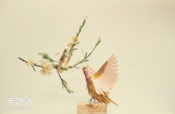 Realistic pictures of handmade paper birds put you in a world of singing birds and fragrant flowers