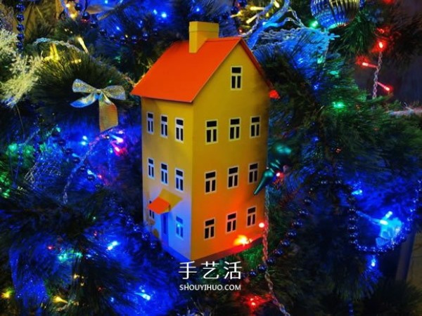 Handmade Christmas house model decoration from cardboard