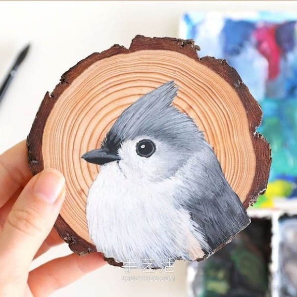 The artist spent 100 days painting 100 species of birds on wood chips