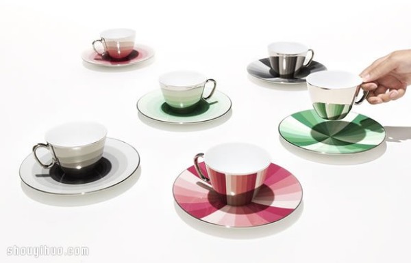 Waltz-like design of mirror-reflected coffee cups and trays of afternoon tea