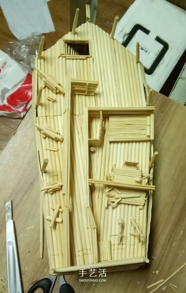 The ancient warship model is hand-made with disposable chopsticks