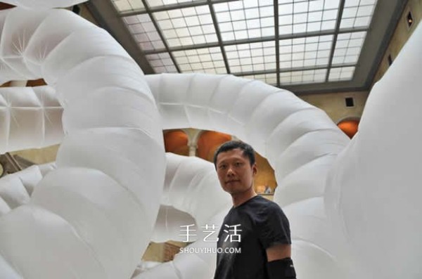 Low-tech power art installation, giant insectPlastic film sculpture