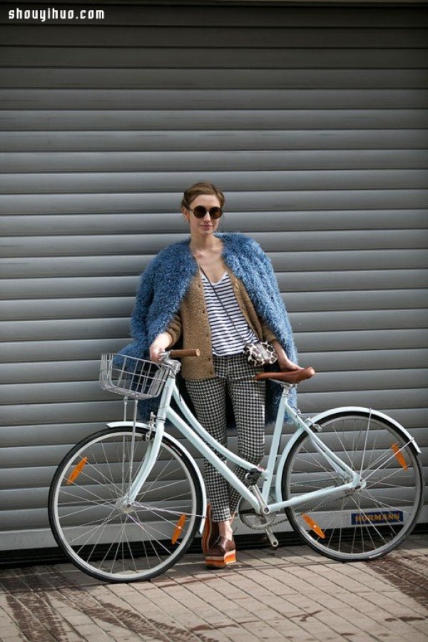 Moscows stylish bicycle girl travels elegantly in the urban area