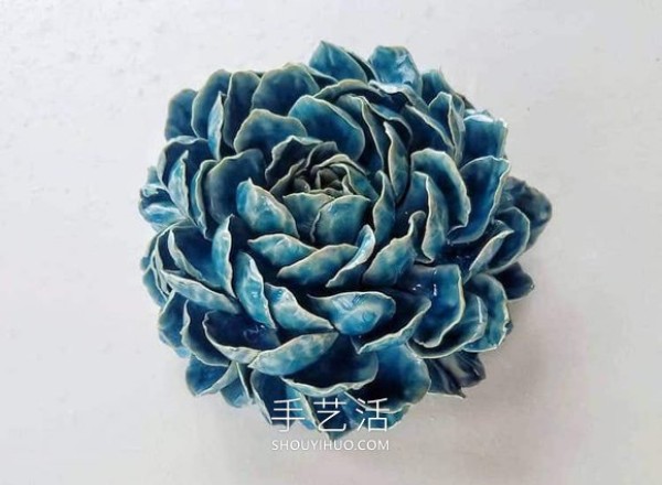 Exquisite handmade porcelain flowers! Looks like real beautiful flowers