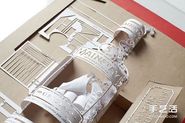 Exquisite paper sculptures create an overturned vodka bottle