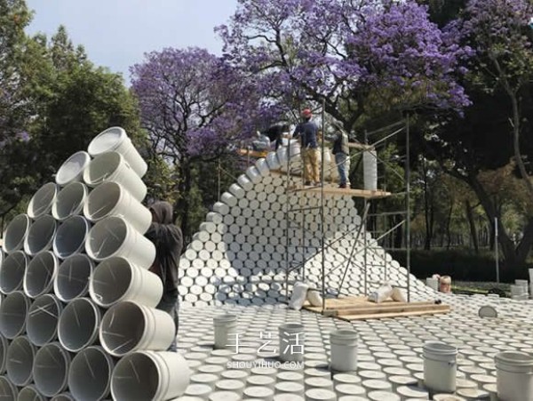 Installation art made with buckets calls for solutions to urban parking chaos