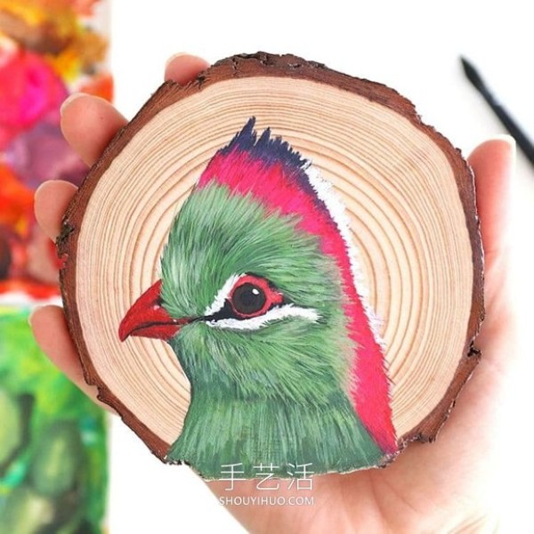 The artist spent 100 days painting 100 species of birds on wood chips