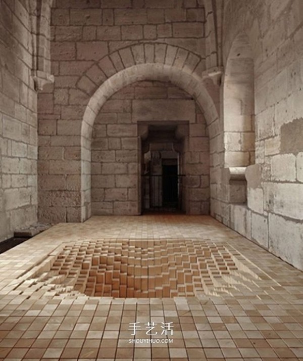 3000 wooden blocks to make a "trap" that swallows the floor