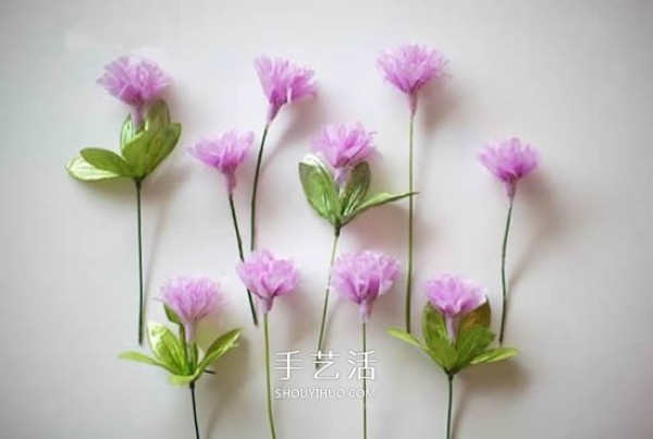 Tutorial on making handmade paper flowers on Mothers Day using crepe paper and making carnations