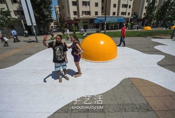 Huge poached eggs! 3 meters wide and 1.5 meters high egg installation art