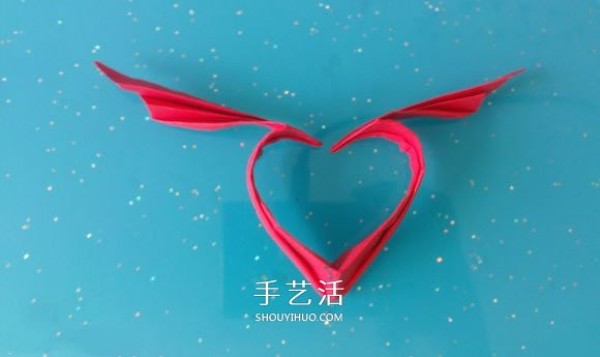 Illustration of how to fold love wings by hand with a heart that has wings that can fly