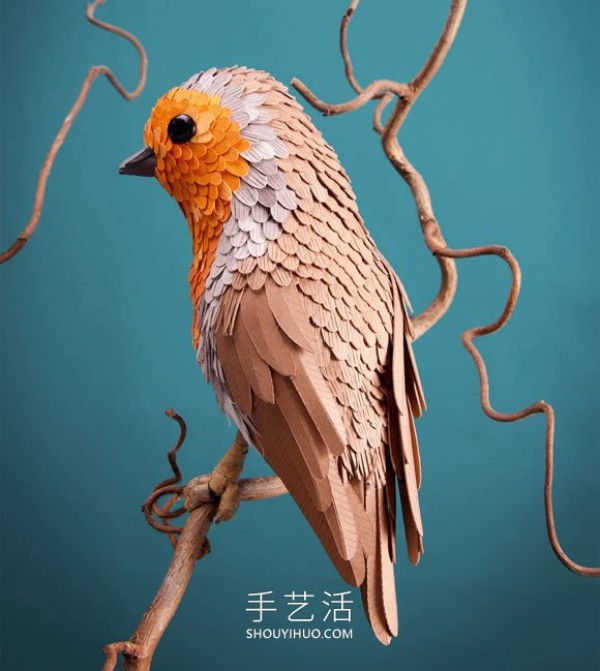 The artist uses 4,000 sheets of paper to sculpt realistic birds and butterflies