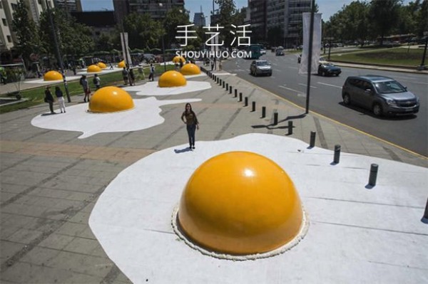 Huge poached eggs! 3 meters wide and 1.5 meters high egg installation art