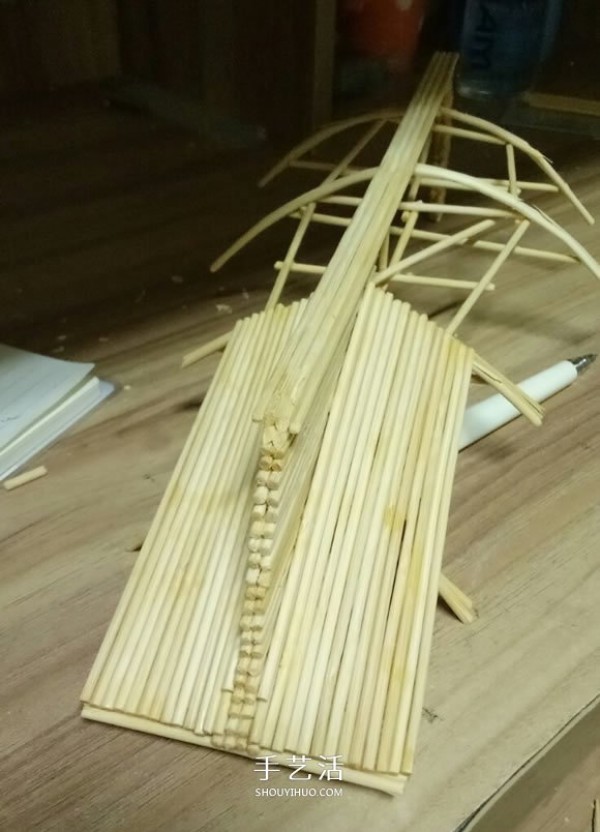 The ancient warship model is hand-made with disposable chopsticks