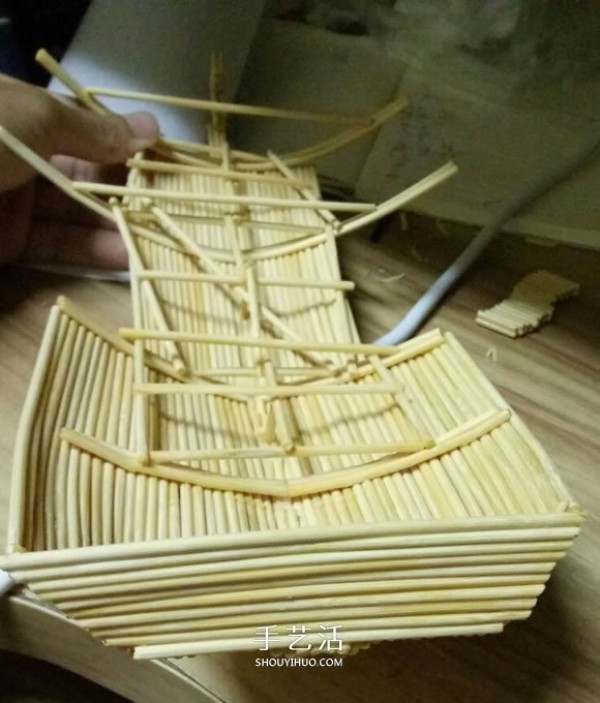 The ancient warship model is hand-made with disposable chopsticks