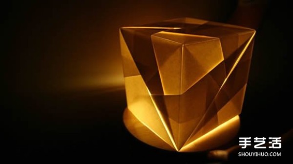 The New London Origami Queen creates artistic origami for three-dimensional lamps and furniture