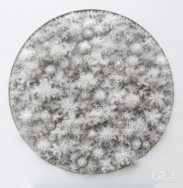 Three-dimensional paper sculptures inspired by bacteria, crystals, etc.