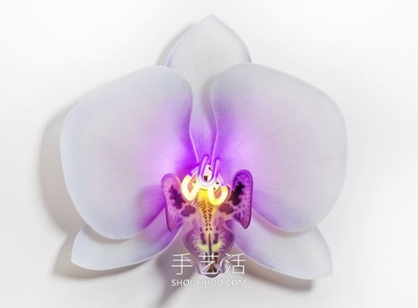 Glowing orchid sculpture artwork made of glass