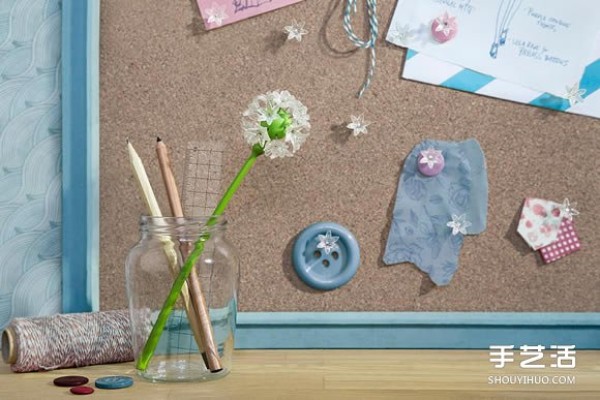 The beautiful dandelion pin makes the office full of positive power