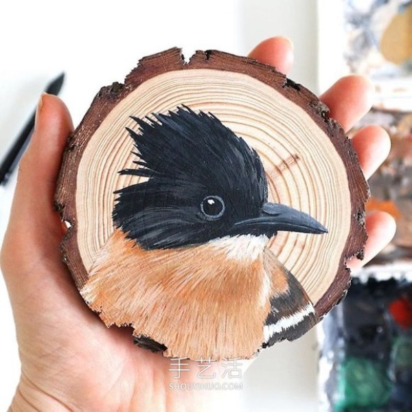 The artist spent 100 days painting 100 species of birds on wood chips