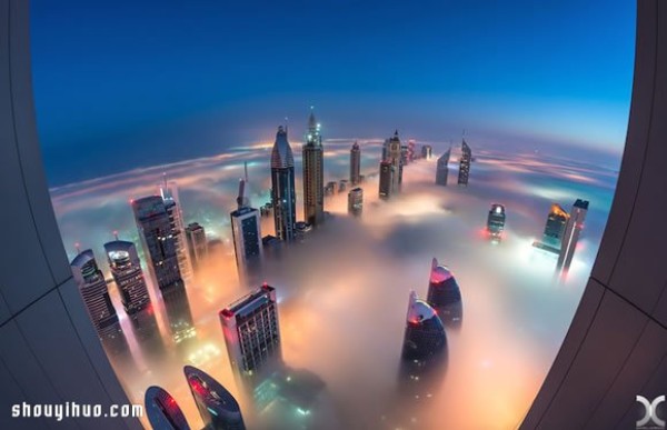 Photography of the city of Dubai on high buildings reveals the city of sky above the clouds and mist