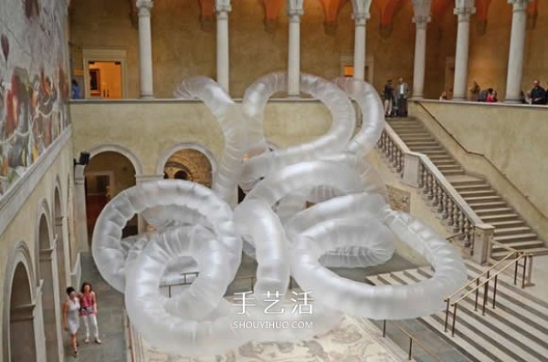 Low-tech power art installation giant insect-shaped plastic film sculpture