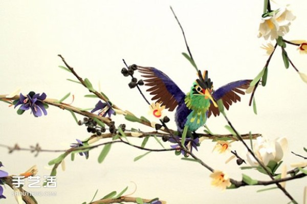 Realistic pictures of handmade paper birds put you in a world of singing birds and fragrant flowers