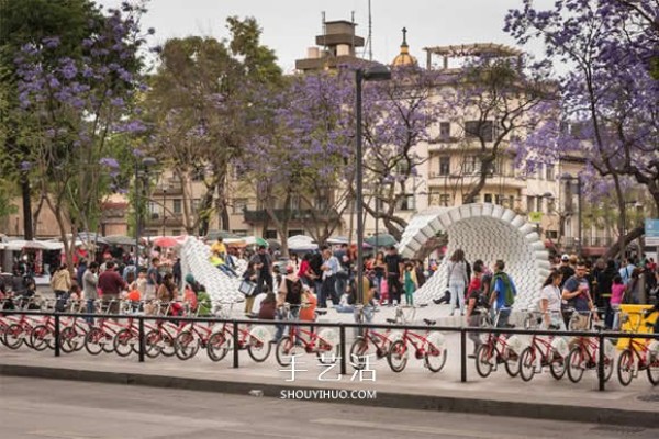 Installation art made with buckets calls for solutions to urban parking chaos