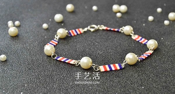 Illustration of a simple homemade pearl bracelet using safety pins to make a bracelet