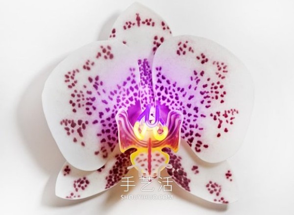 Glowing orchid sculpture artwork made of glass