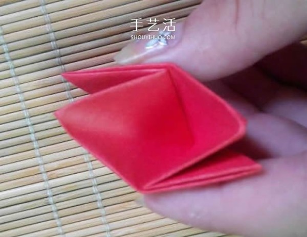 Illustration of the origami method of a lotus that is about to fully bloom