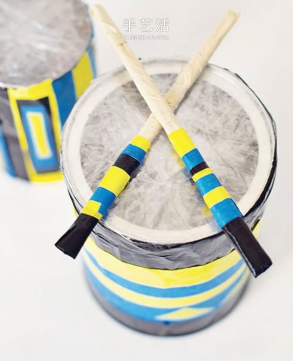 How to make a homemade toy drum and a tutorial on how to make a drum out of waste iron cans