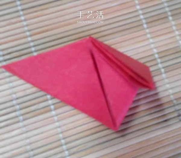 Illustration of the origami method of a lotus that is about to fully bloom