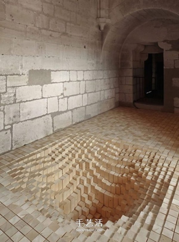 3000 wooden blocks to make a "trap" that swallows the floor