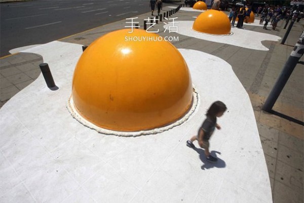 Huge poached eggs! 3 meters wide and 1.5 meters high egg installation art