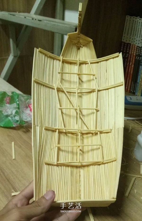 The ancient warship model is hand-made with disposable chopsticks