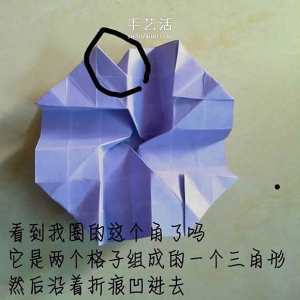 The process of folding an origami Kawasaki rose with a flower center