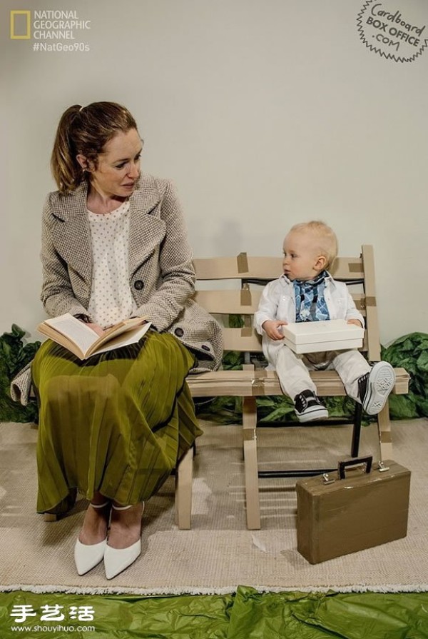 The role-playing time of a family of three in a homemade movie scene from a cardboard box