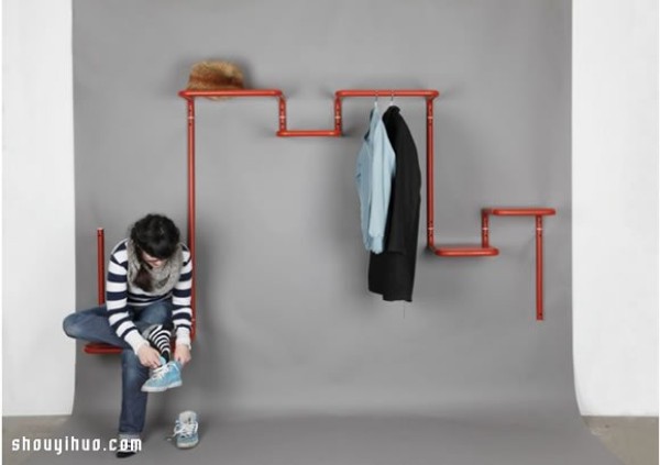 It is a chair that is also a bookshelf, a super practical and versatile clothes hanger product design