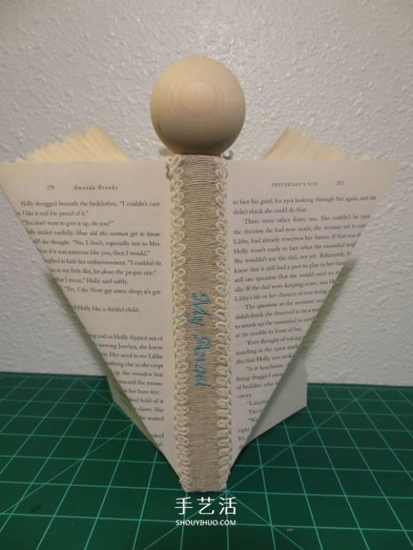 Christmas Angel Book Ornament DIY, a very creative reuse of old books