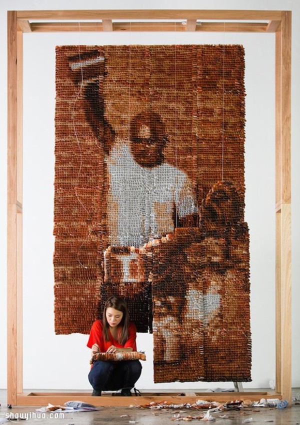 Twenty thousand tea bags create a large portrait of a "Teh Tarik Man" Like