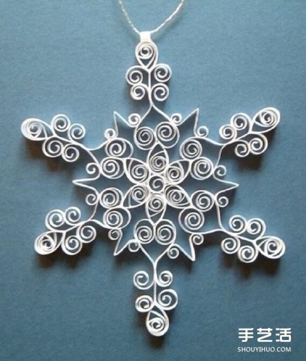 Hand-made paper snowflake tutorial, illustrations of how to make beautiful rolling paper snowflakes