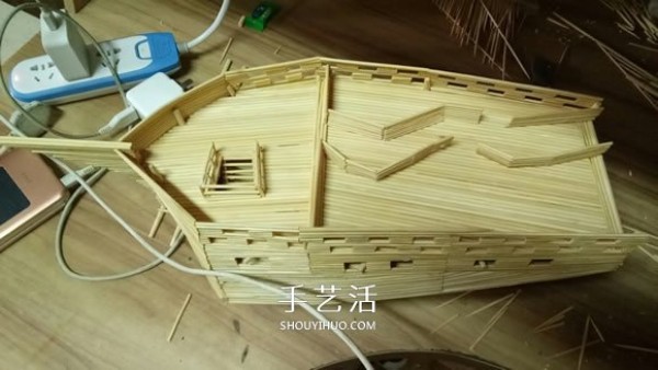 The ancient warship model is hand-made with disposable chopsticks