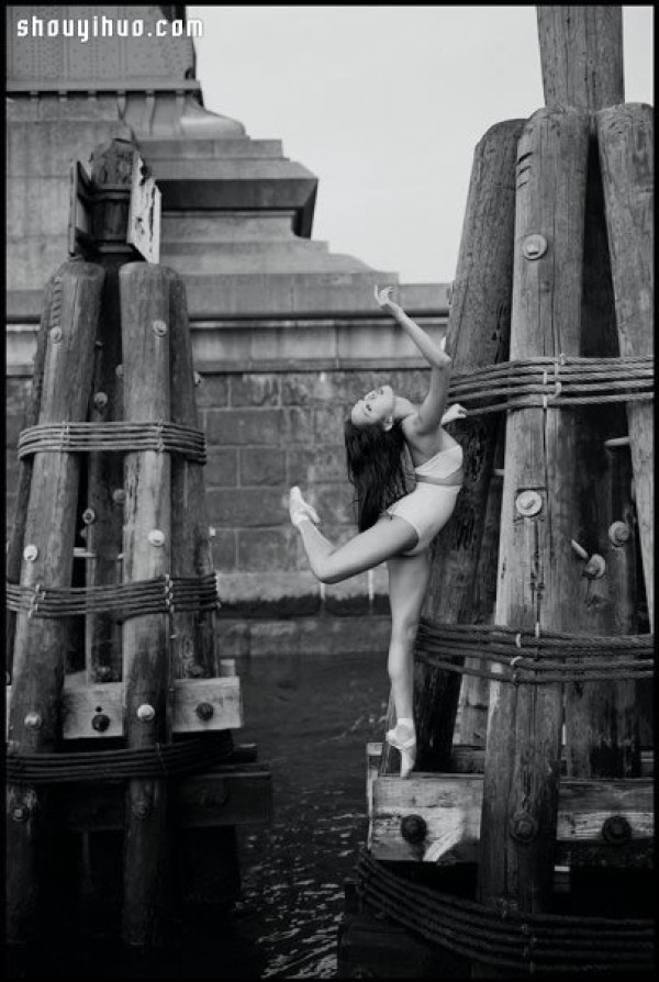 The graceful ballet postures outside the pointe art stage under the camera