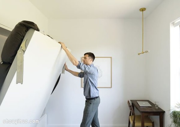 66 square meters small apartment is decorated into a simple living space for 3+1 people