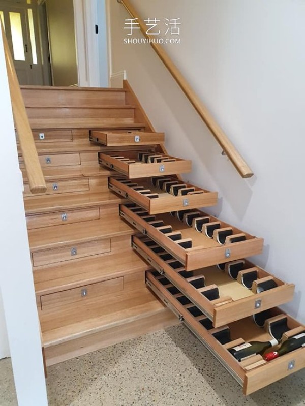 He transformed the stairs into a "wine cellar" that can store 156 bottles of red wine