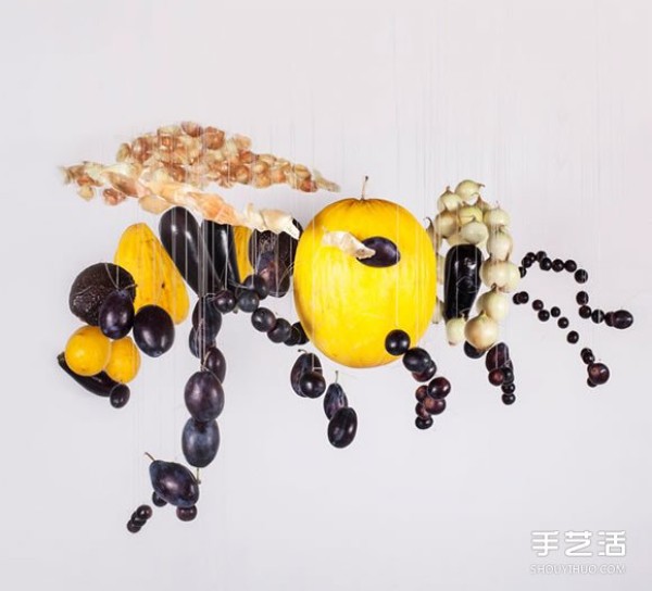 Use visual dislocation from a specific angle to create large-scale food art