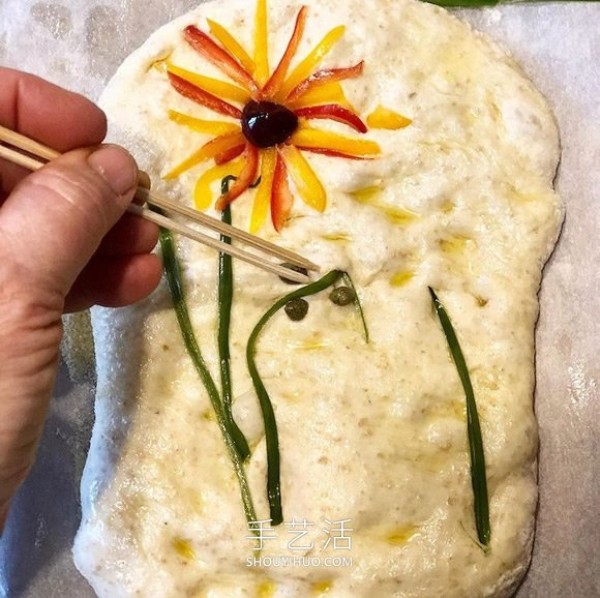 Focaccia bread is used as a canvas to create Van Gogh style art paintings