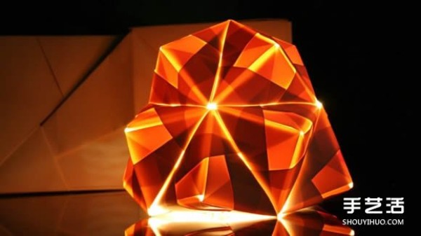 The New London Origami Queen creates artistic origami for three-dimensional lamps and furniture